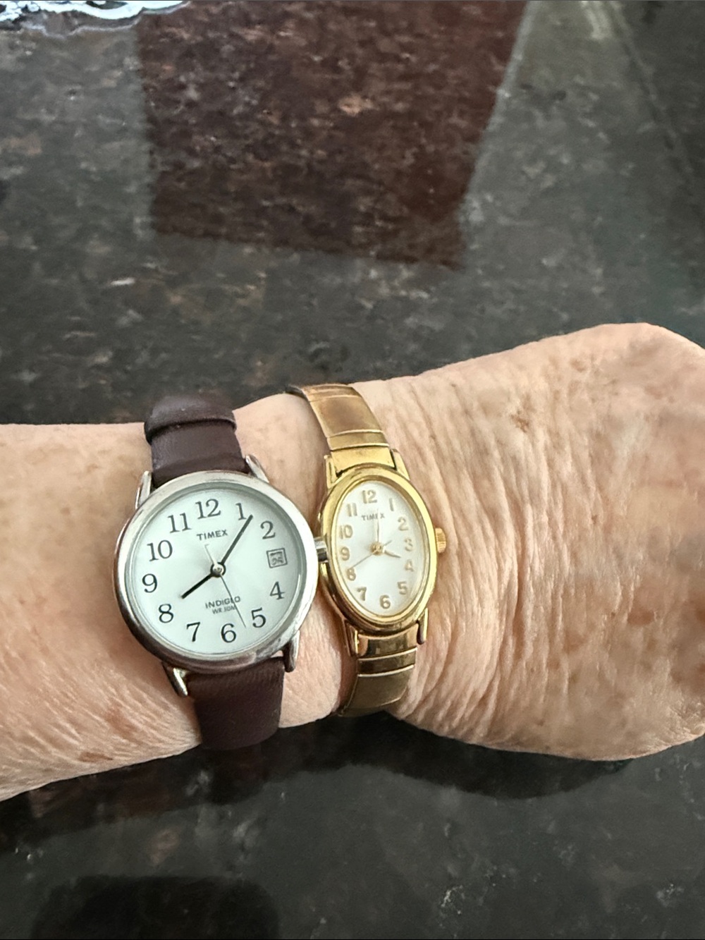 Two TIMEX battery operated watches.  Currently not running.